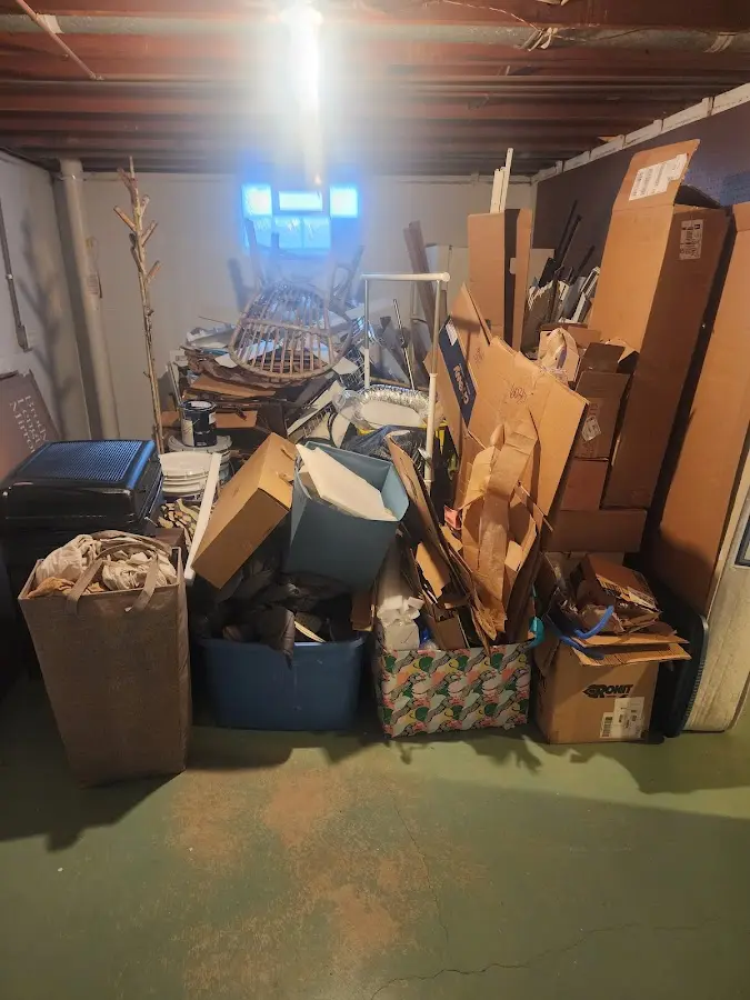 Roll-off dumpster container at job site for 2 Yard Dumpster Rental in Wilson's Mills